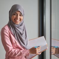 portrait-of-businesswoman-smiling-wearing-hijab-in-2023-11-27-05-24-35-utc